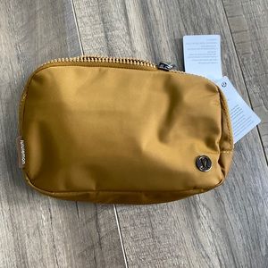 NWT TWO AVAILABLE. RARE Lululemon Bronze Brown Everywhere Belt Bag 1L